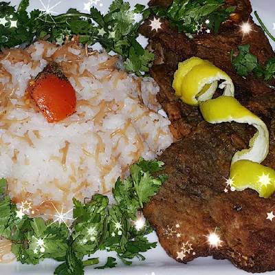  سمك مقلي وأرز مصري بالشعيريه