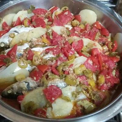  سمك بورى بقطع البطاطس والطماطم والكرفس 