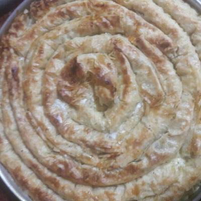  صينية جلاش حلزونى بالجبنة 