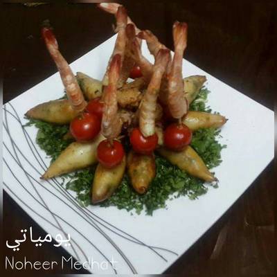  طريقة عمل كاليماري محشي بالأرز والجمبري 