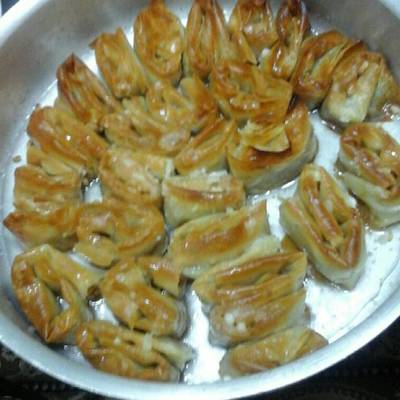  الجلاش الملفوف بالمكسرات والشربات 