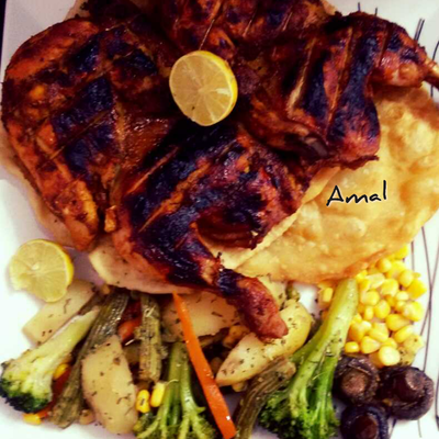  فراخ بتتبيلة تكا والعيش البوري مع الخضار المشوي 