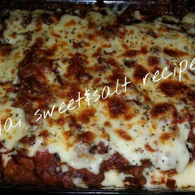  بانية بالذنجان وصوص الطماطم 