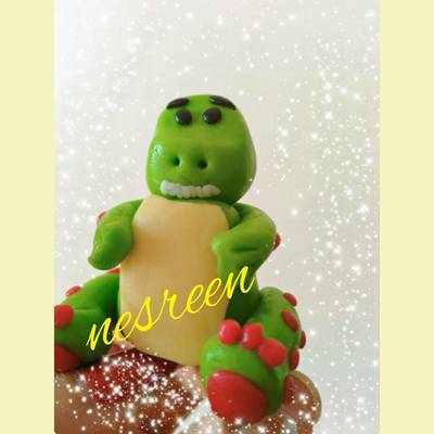  مجسم الديناصور بعجينه السكر 