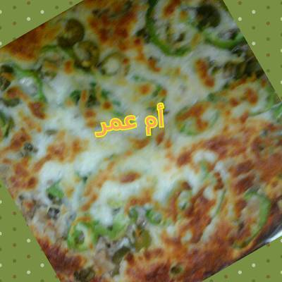  بيتزا بالمشروم واللحم 